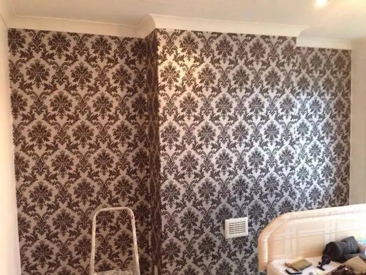 Black and silver damask feature wall